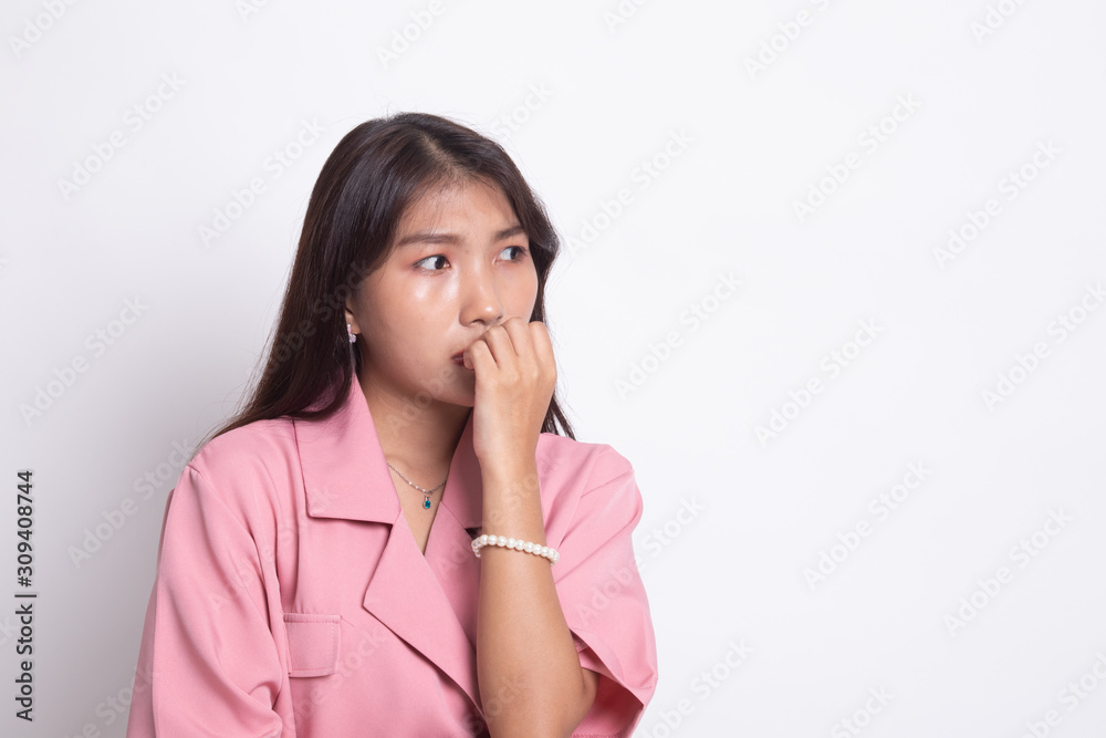 Unsure hesitant nervous young asian woman biting her fingernails. Unsure hesitant nervous young asian woman biting her fingernails.