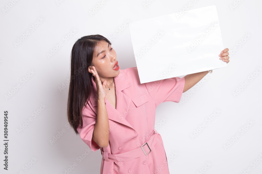 Young Asian woman surprise with white blank sign. Young Asian woman surprise with white blank sign.