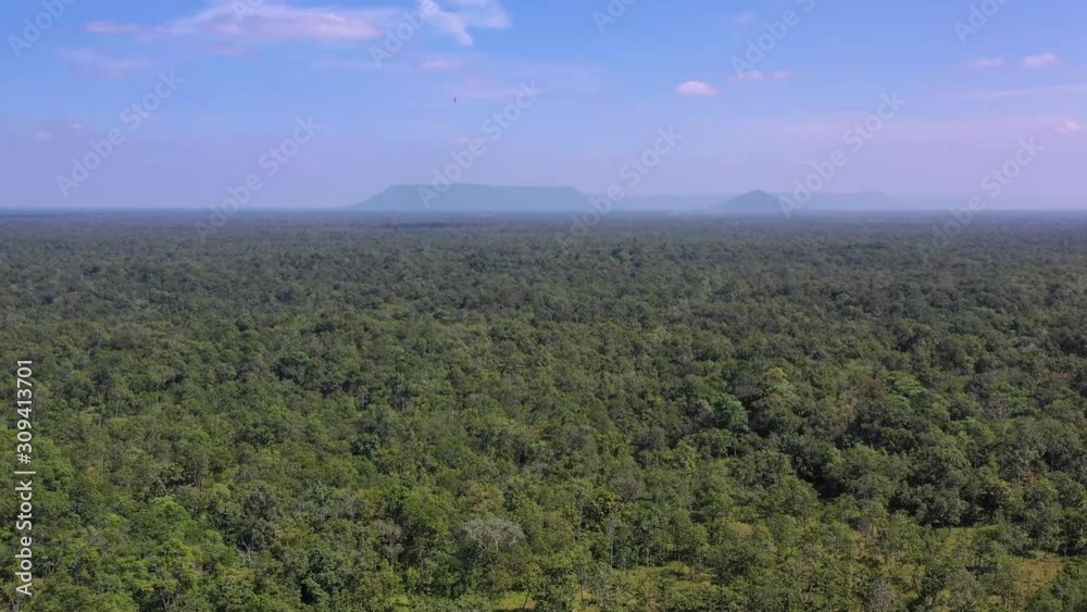 Ancient khmer pyramid in Koh Ker, Cambodia with blue sky and clouds, sunny day