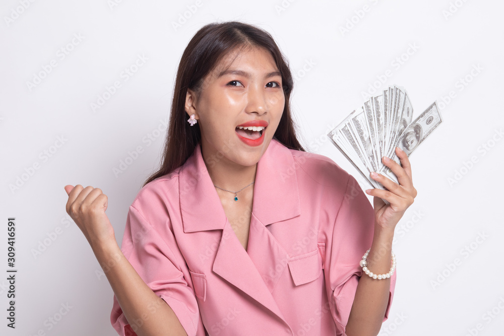 Portrait of young asian woman showing bunch of money banknotes. Portrait of young asian woman showing bunch of money banknotes.