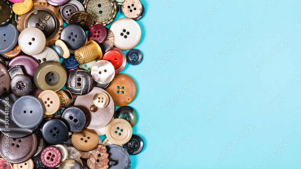 many of various buttons on blue with copyspace many of various buttons on blue with copyspace