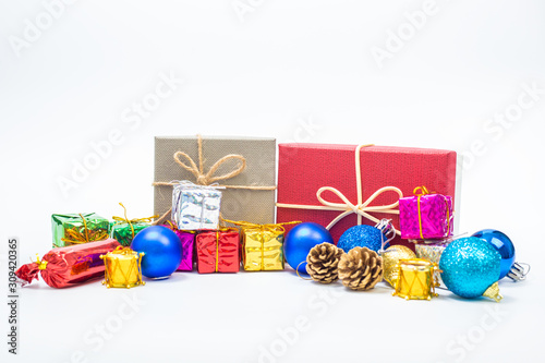 Close up of Cristmas present box with some colorful papper and toys
