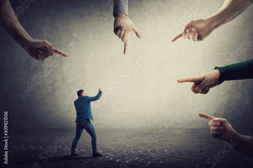 Konstfotografi Frustrated businessman starts fighting against people blaming him