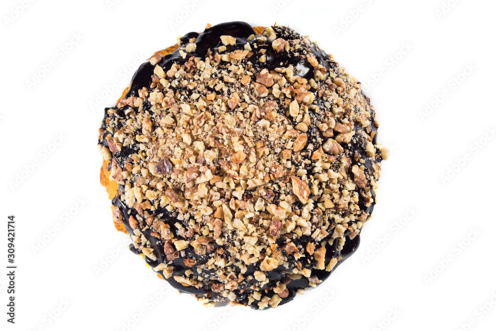 Chocolate cake with nuts isolated on a white background. Top view. Chocolate cake with nuts isolated on a white background. Top view.