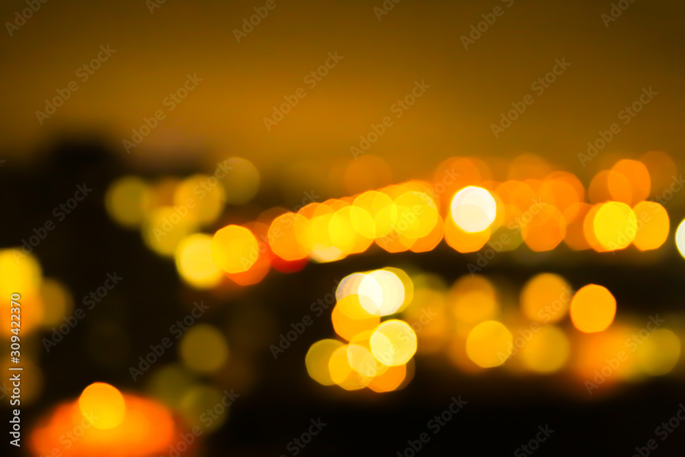 Blurred night city lights photo. Abstract pattern background in bokeh effect. Blurred night city lights photo. Abstract pattern background in bokeh effect.