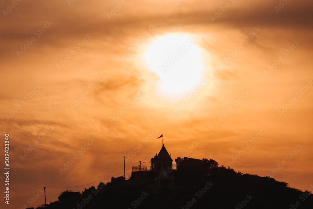 Sunset at the temple above the hills in Wankaner, Gujarat, India