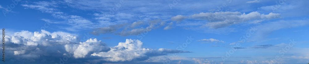 Summer sky and clouds. Panoramic photo, August, rainy season, atmospheric phenomena. Summer sky and clouds. Panoramic photo, August, rainy season, atmospheric phenomena.