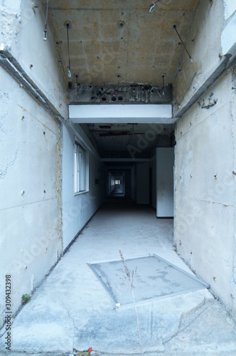 Ruined walkway in a concrete building