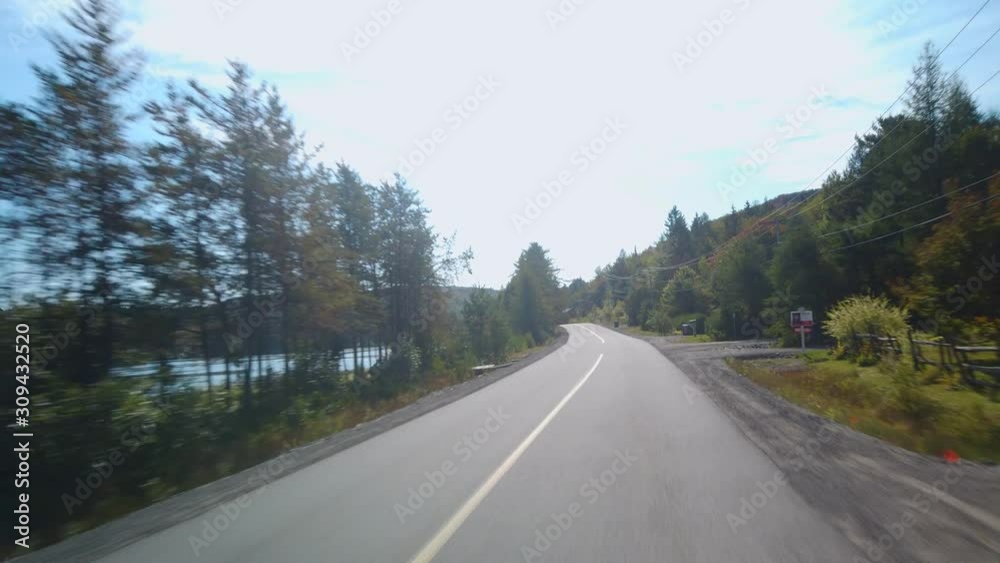 Driving Gimbal Shot On Rural Road During Autumn in Canada Driving Gimbal Shot On Rural Road During Autumn in Canada