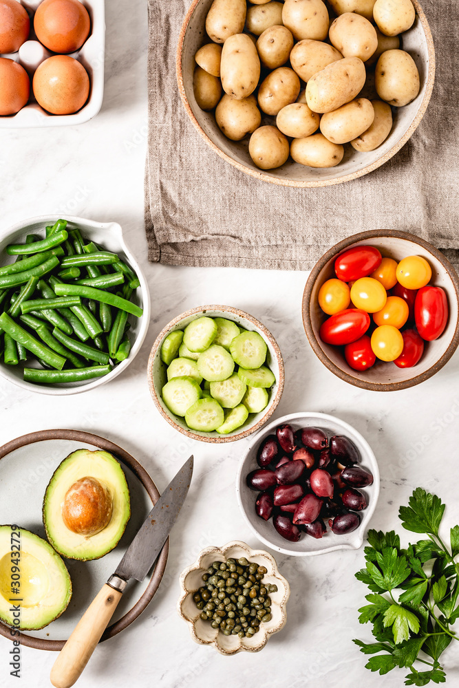 Ingredients for a salad on a white background Ingredients for a salad on a white background