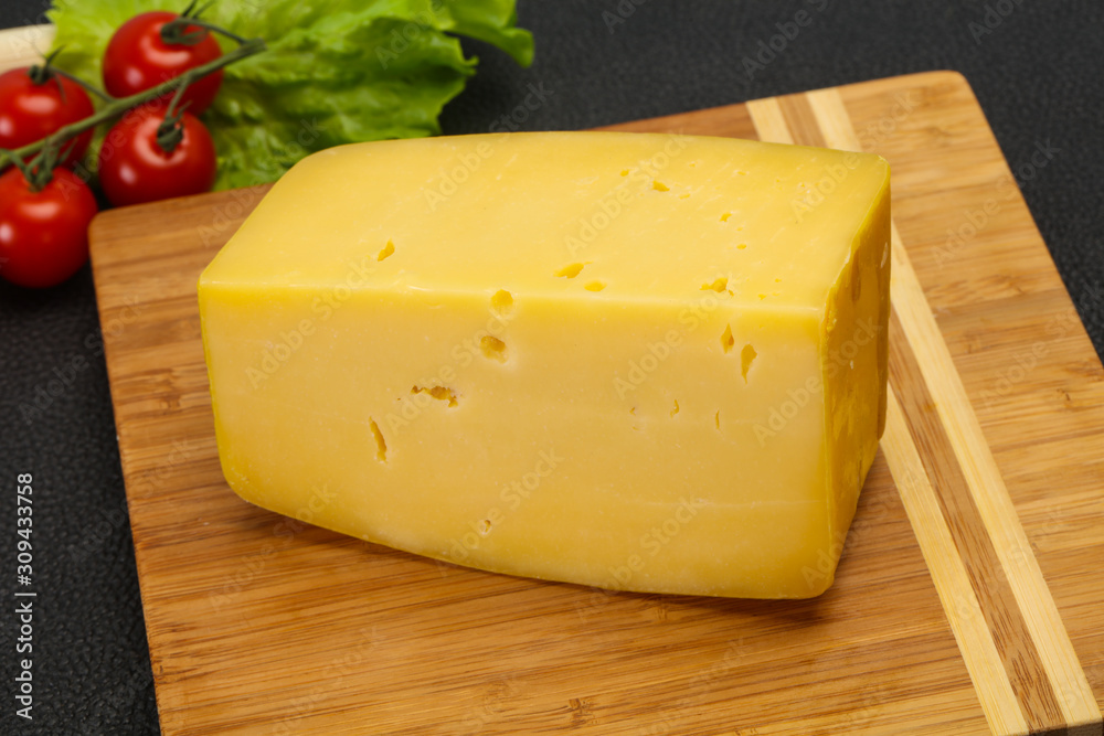 Hard yellow tasty cheese brick Hard yellow tasty cheese brick