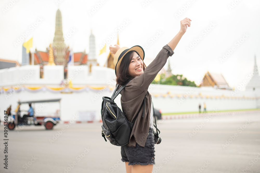 Young Asian travel girl is enjoying with beautiful place in Bangkok, Thailand