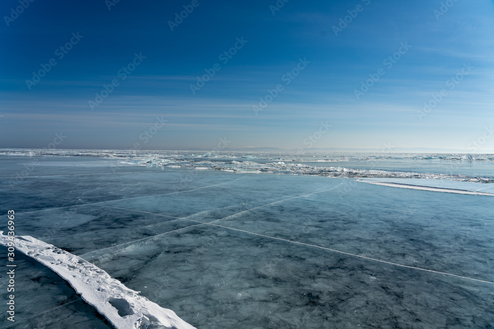 Panoramic view on ice on big lake