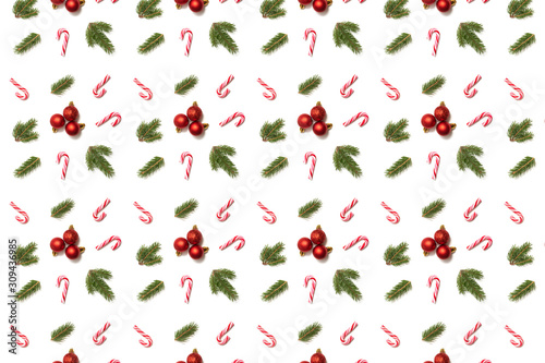 Christmas red balls with spruce branches and canes, seamless pattern on white