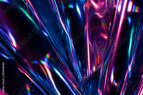Reflection of light on holographic foils with neon lighting