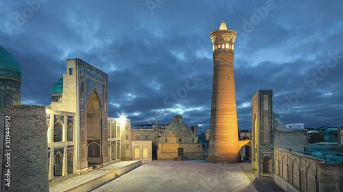 Poi Kalan at dusk - an Islamic religious complex located around the Kalan minaret in Bukhara, Uzbekistan (static image with animated sky)