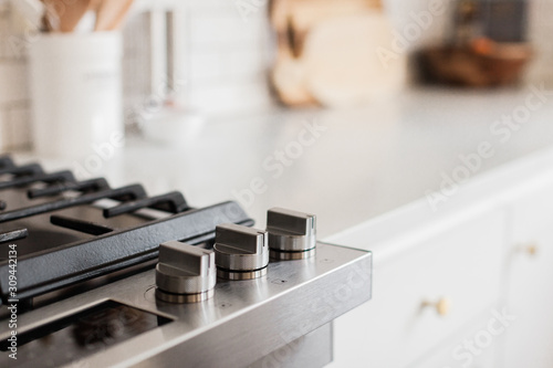 Modern Stovetop in White Kitchen