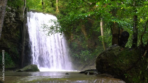 Erawan Waterfall in Spring trees colorful waterfall form mountain in the nature, Beautiful in Spring leaves season at Kanchanaburi,Thailand