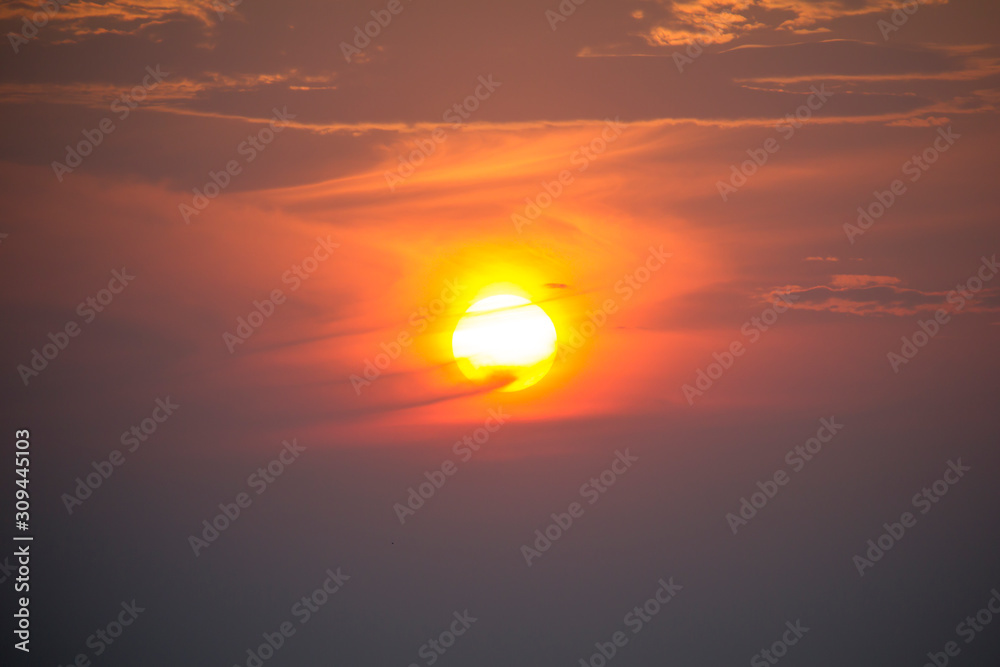 Sun in beautiful violet clouds