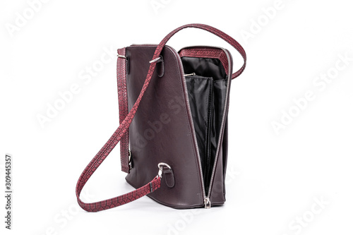 Fashion women leather dark red backpack isolated on a white background.