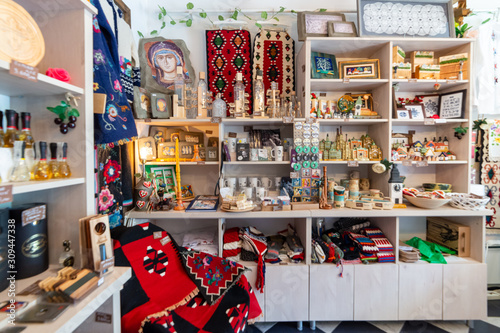 Fotografie Novi Sad, Serbia August 16, 2019: In the outskirts of the Petrovaradin Fortress, also known as the Town of Novi Sad, there is a beautifully decorated souvenir shop - the Werkštat Concept Store