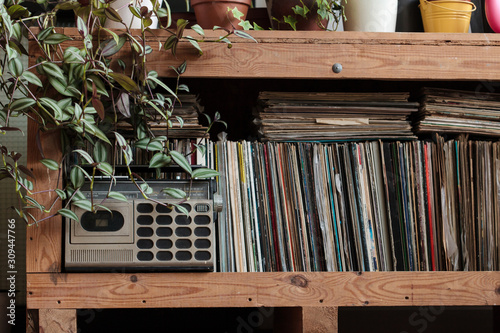 Vintage Radio Cassette Recorder with Vinyl Records photo