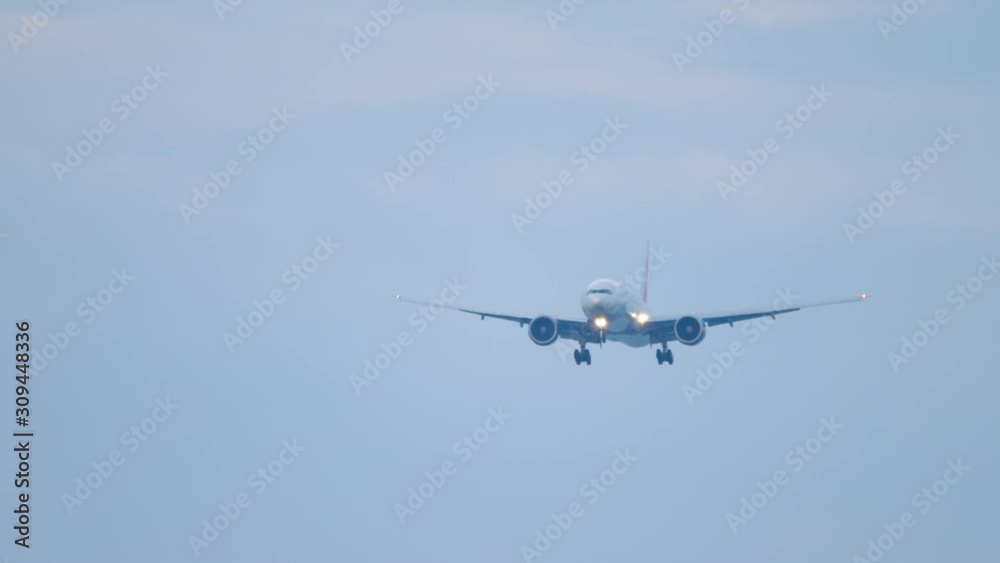 Widebody airplane approaching before landing Widebody airplane approaching before landing