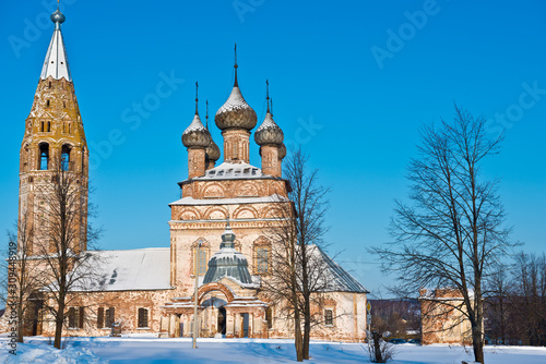 Winter landscape with a view of the Temple complex of churches of the Beheading of St. John the Baptist and Ascension/ village Parskoe/ Rodnikovsky district/ Ivanovo region/ Russia. photo