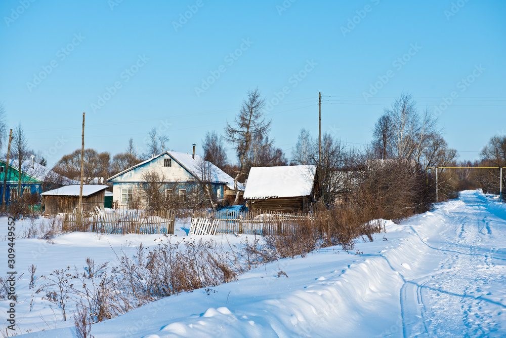 Winter landscape with a view of a typical small russian village Parskoe/ Rodnikovsky district/ Ivanovo region/ Russia