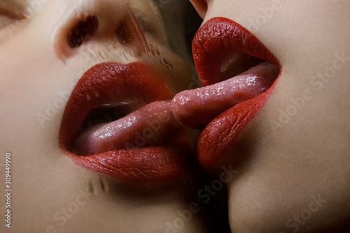 red lips french kissing in the mirror closeup