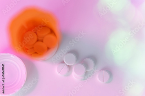 Prescription medicine in pink haze photo