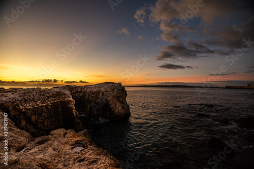 Sunrise over the sea. Rocks on the first plan © malgorzata_wieczorek