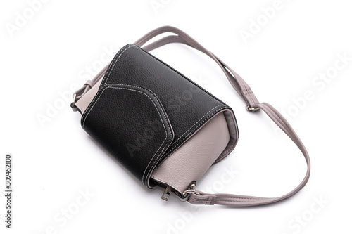 Luxury fashion women leather black handbag isolated on a white background.