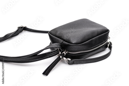 Luxury fashion women leather black handbag isolated on a white background.