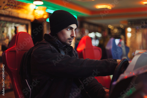 Man in retro game room photo