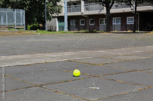 tennis ball in housing estate © Serge