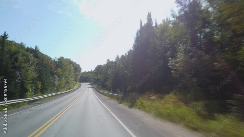 Driving Gimbal Shot On Rural Road During Autumn in Canada Driving Gimbal Shot On Rural Road During Autumn in Canada