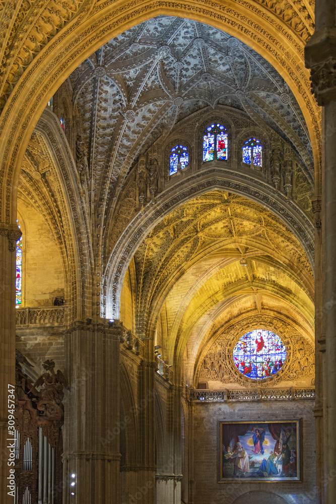 Interior of Seville cathedral. The cathedral is the biggest gothic and third christian church of the world.