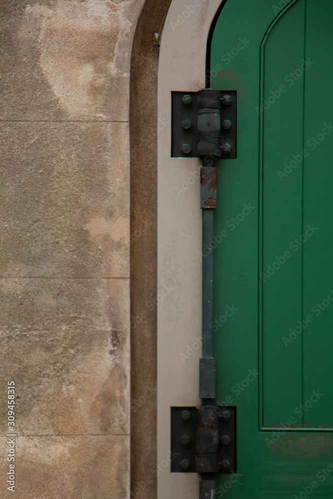 green door with hinges green door with hinges