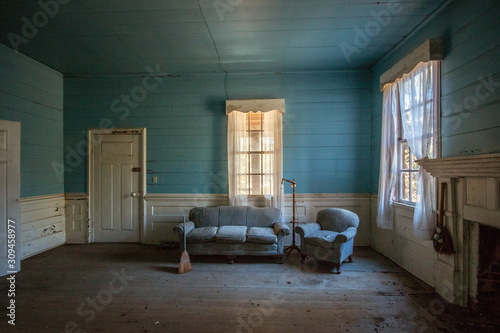 dusty barren blue room
