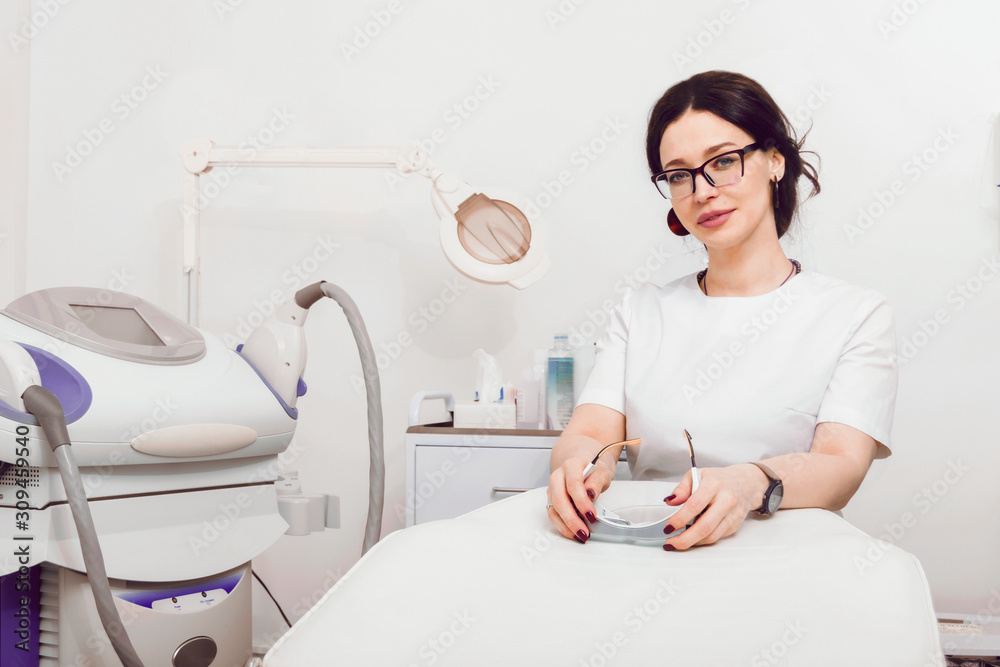 Portrait of a female professional cosmetologist in the office. Portrait of a female professional cosmetologist in the office.
