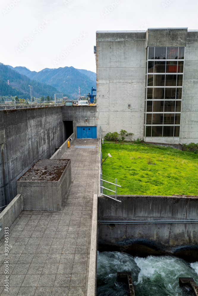 A Fish Ladder Flows Near the Entrance of Power House Two at the Bonneville Dam, Washington, USA