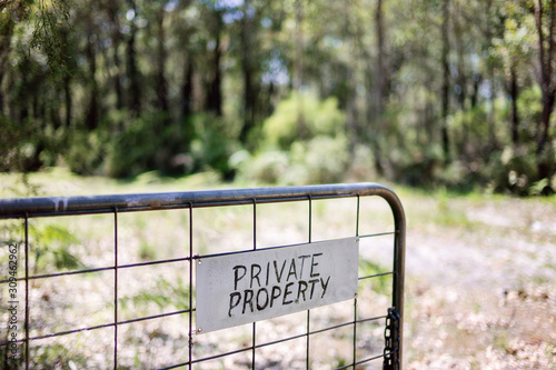 Private property sign on a gate
