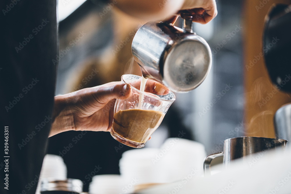 Man pouring coffee Man pouring coffee