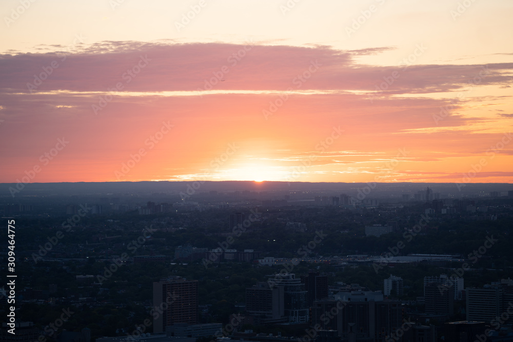 beautiful glowing sunset over city