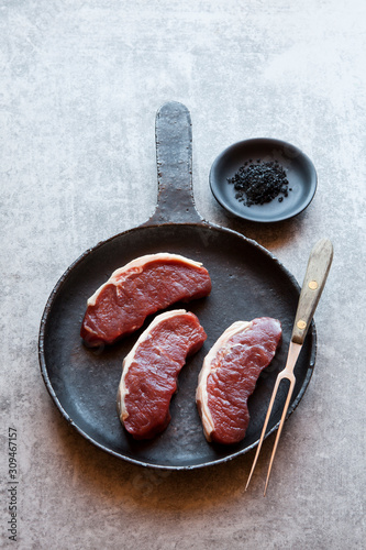 Raw beef sirloin steaks