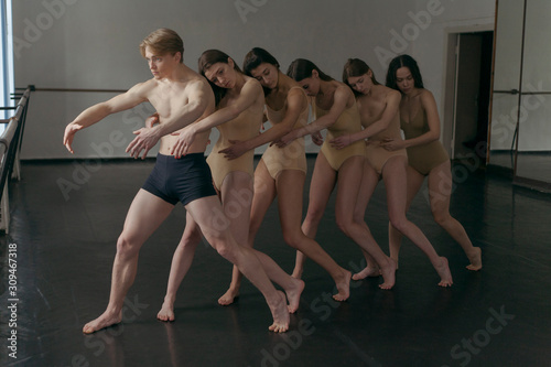 choreographers posing symmetrically photo