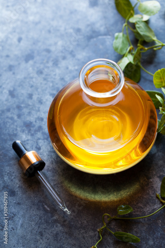 Face and body skin care oil