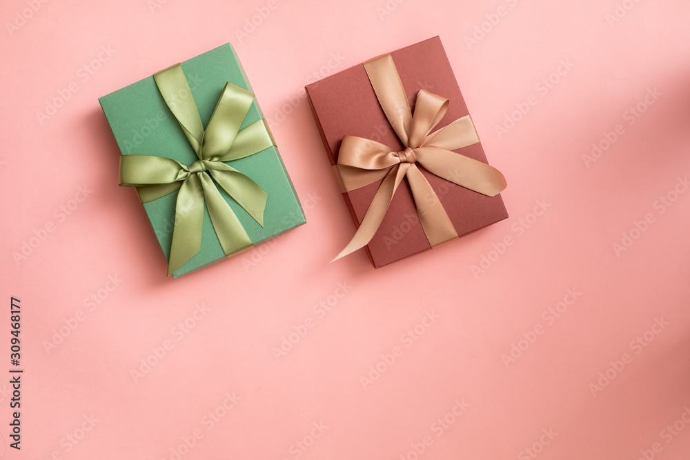 gift box with ribbon and bow isolated on pink gift box with ribbon and bow isolated on pink