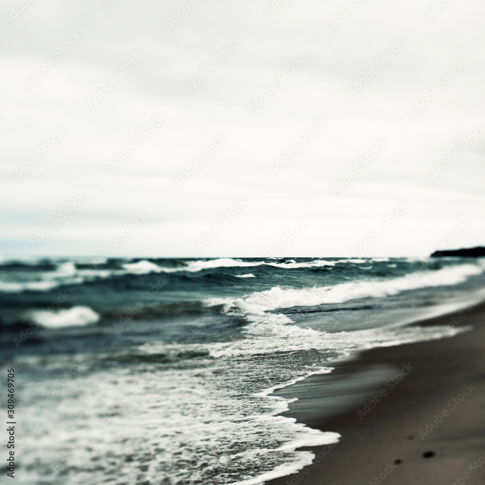 Large Waves Crashing Onto An Ocean Beach Large Waves Crashing Onto An Ocean Beach